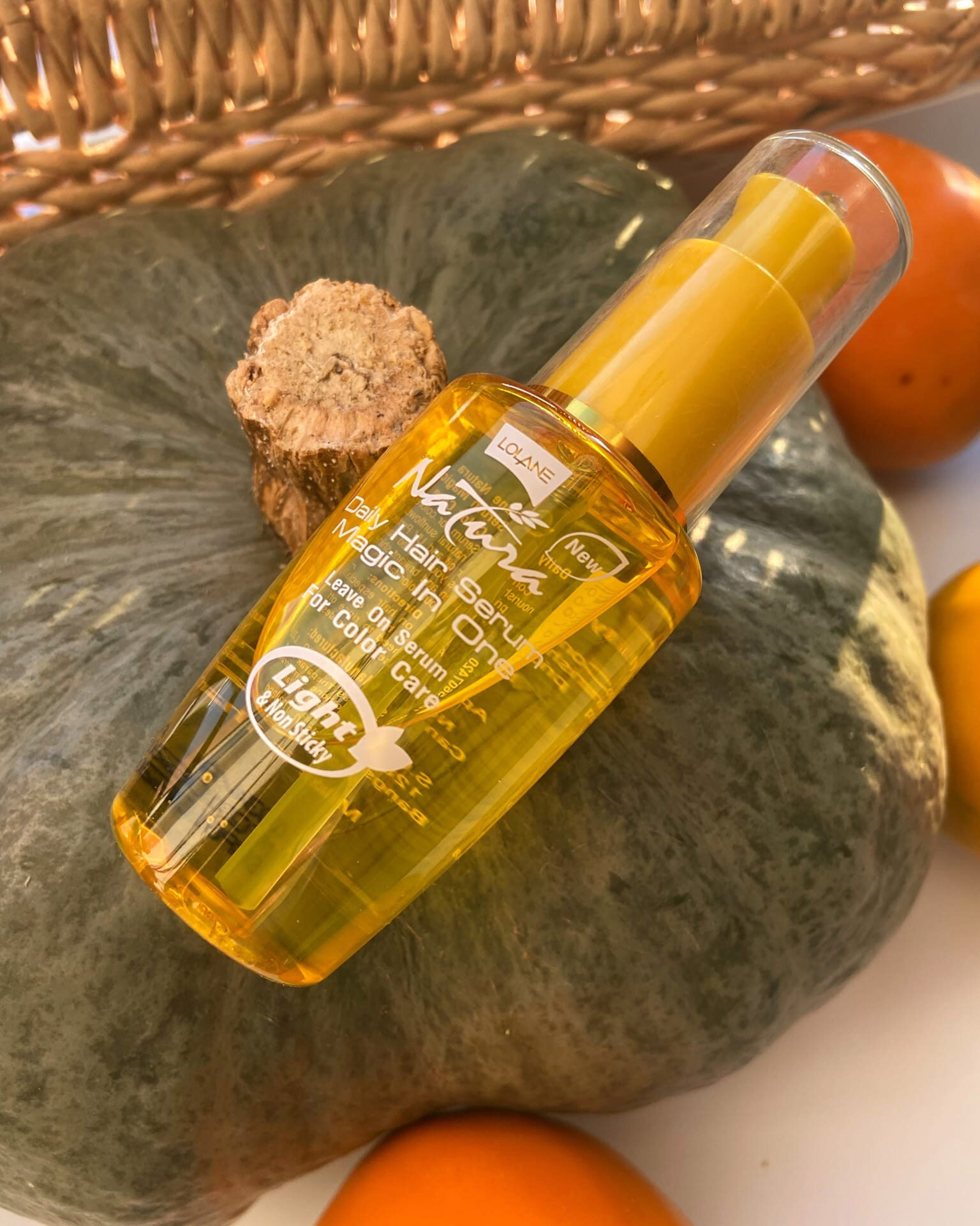 Купить сыворотку из Тайланда Лолан для окрашенных волос с Подсолнечником Lolane Natura daily hair serum magic in One For Color Care в Москве